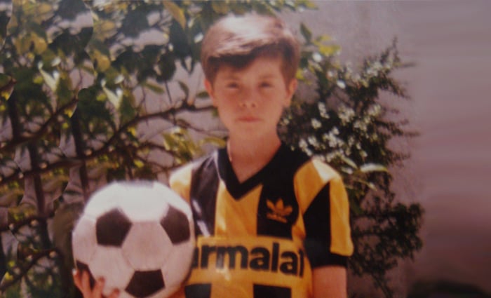 Ramiro wearing Peñarol's kit at age 7